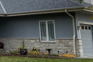 Seamless gutter installation on a Delafield, WI residence by Adonis Roofing